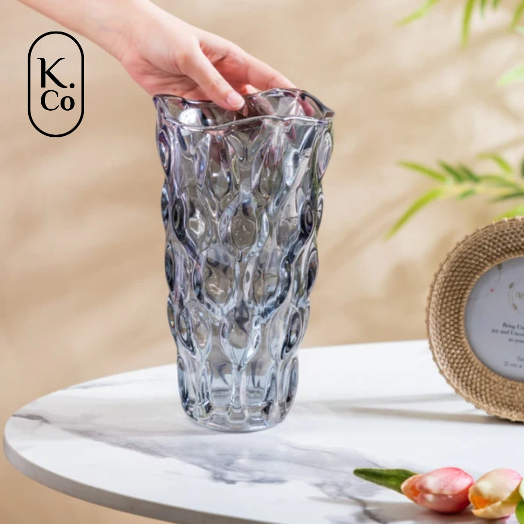 Golden Wave - a sleek glass vase adorned with wavy patterns of light and dark gold through light