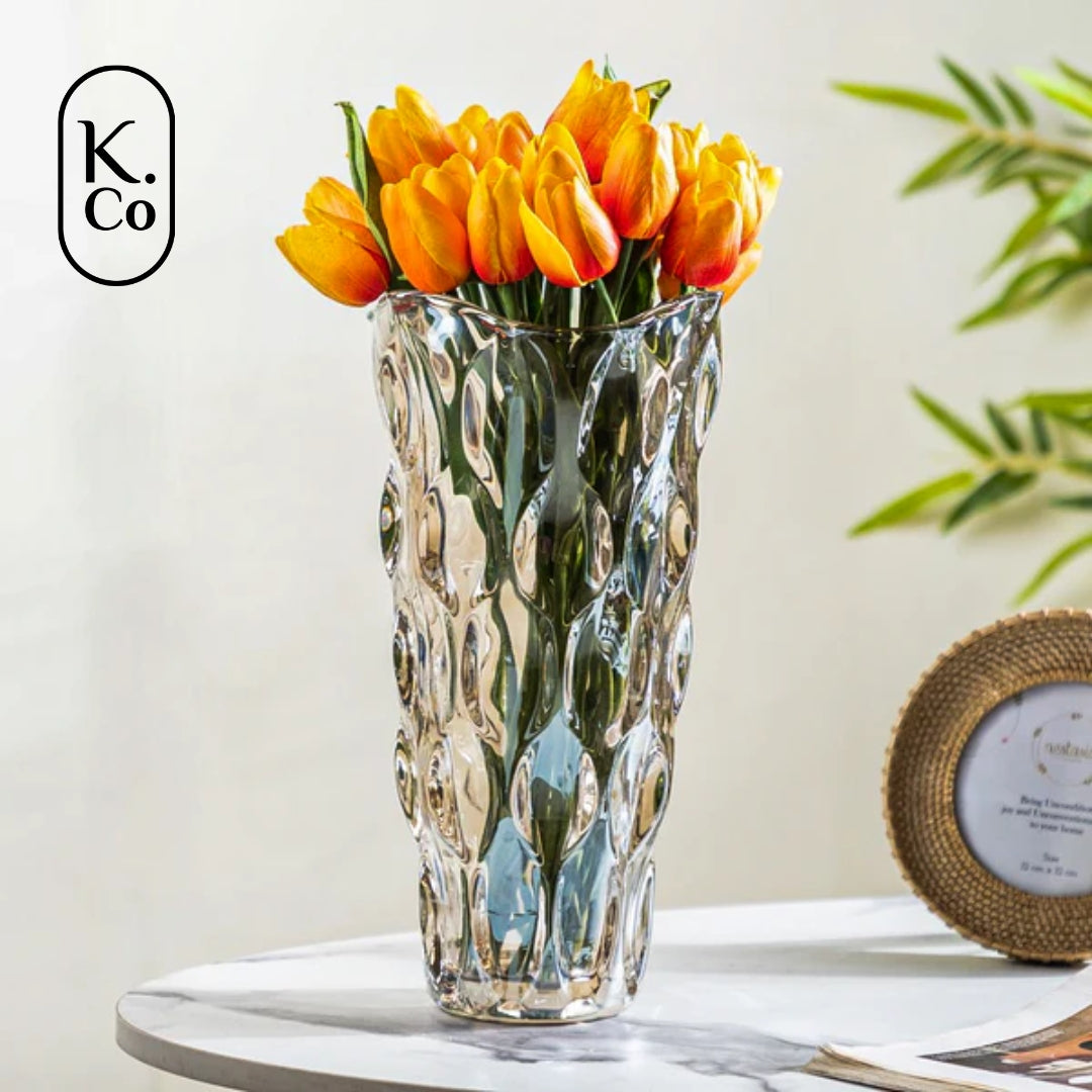 Golden Wave - a sleek glass vase adorned with wavy patterns of light and dark gold through light