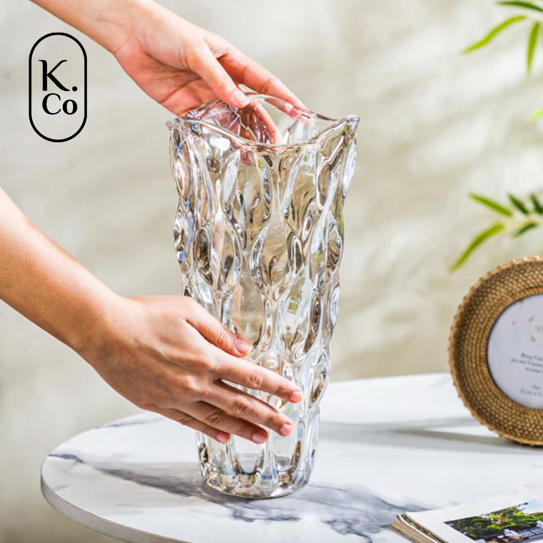 Golden Wave - a sleek glass vase adorned with wavy patterns of light and dark gold through light