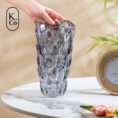Golden Wave - a sleek glass vase adorned with wavy patterns of light and dark gold through light