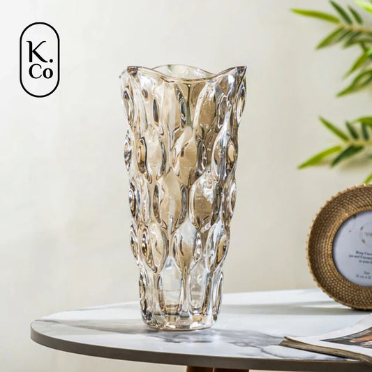 Golden Wave - a sleek glass vase adorned with wavy patterns of light and dark gold through light